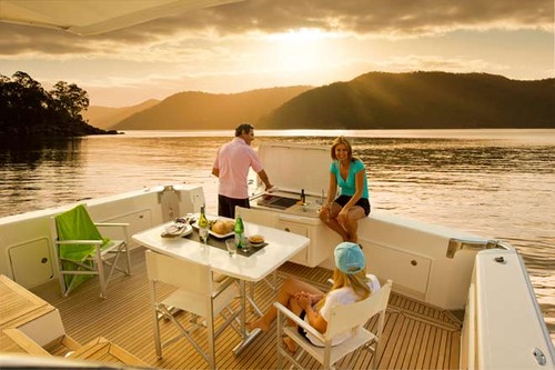 Five-star alfresco dining at its best aboard a Riviera. © Mark Rothfield